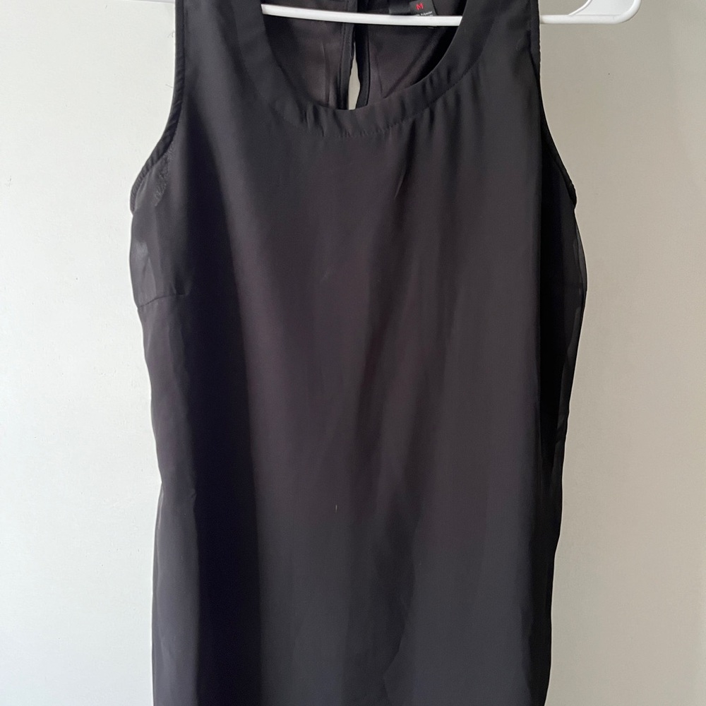 Little black dress sheer hemline goes lower than dress hem. , very pretty